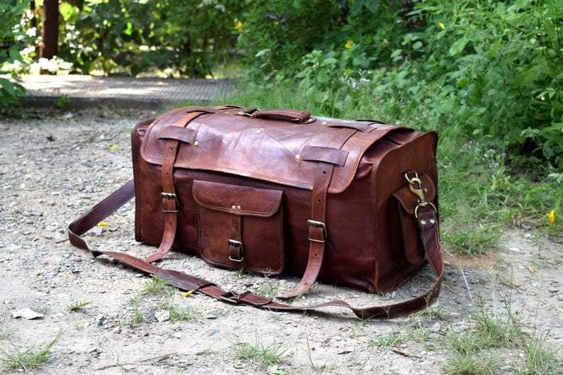 black leather duffle bag